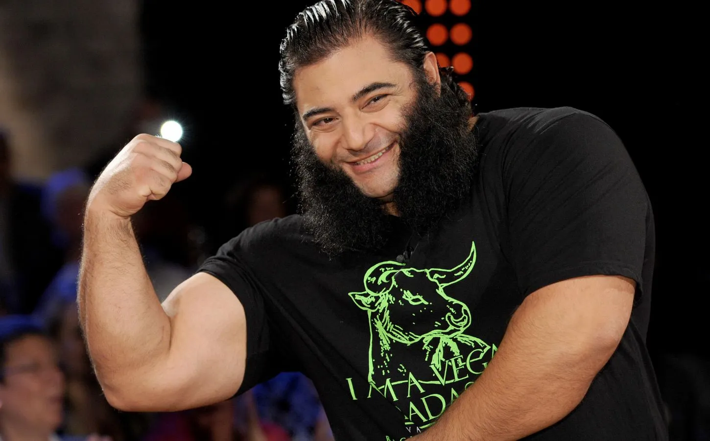 Patrik Baboumian, vegan strongman, carrying a heavy yoke